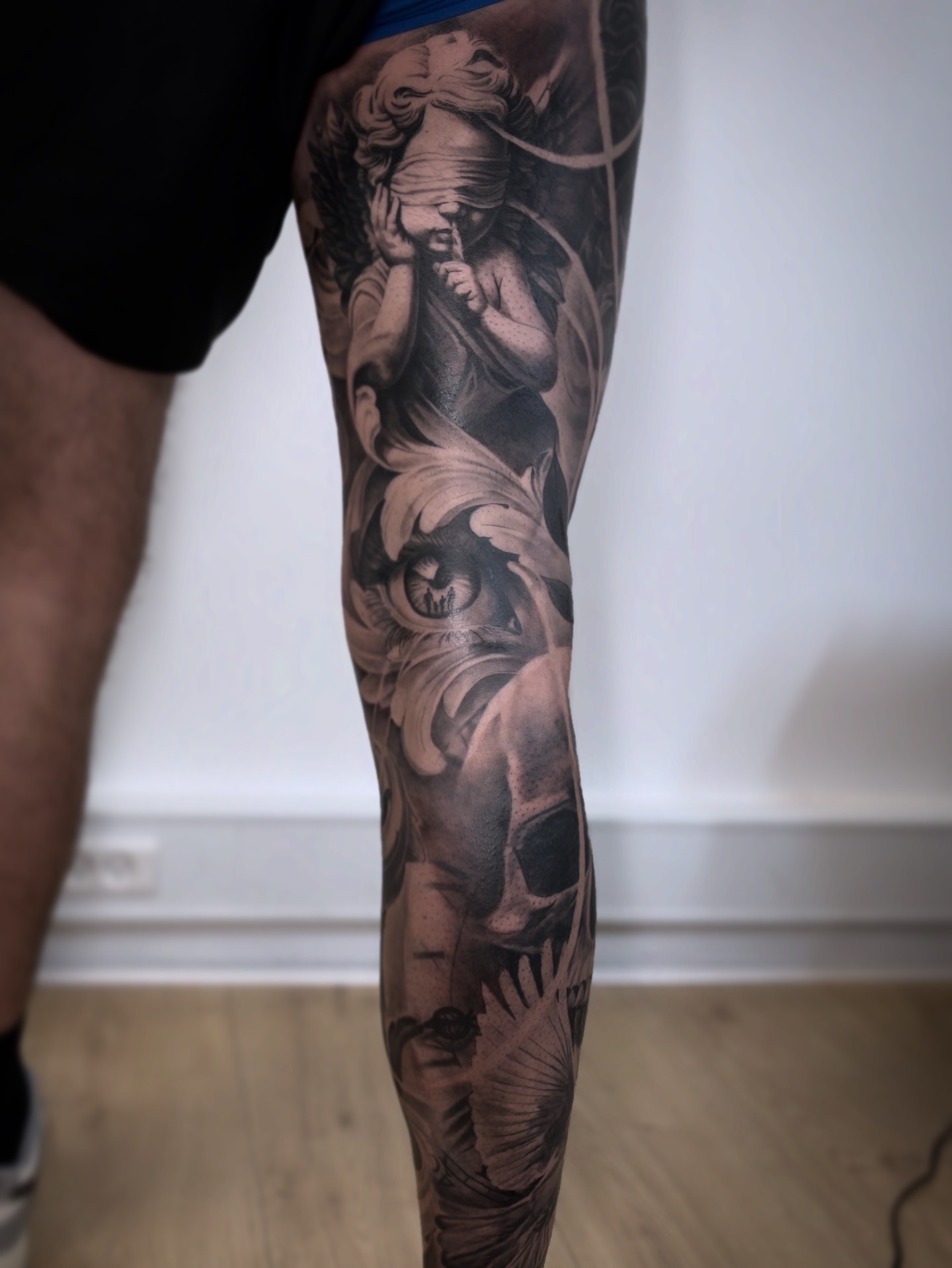 leg sleeve tattoo realism black n grey bng