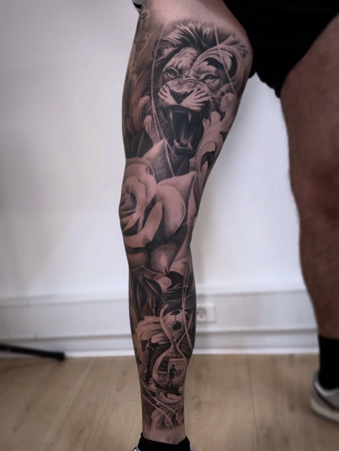 leg sleeve tattoo lion